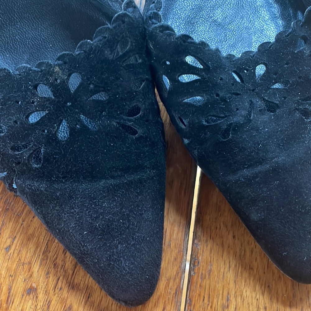 Black suede flower cutout slip on mules